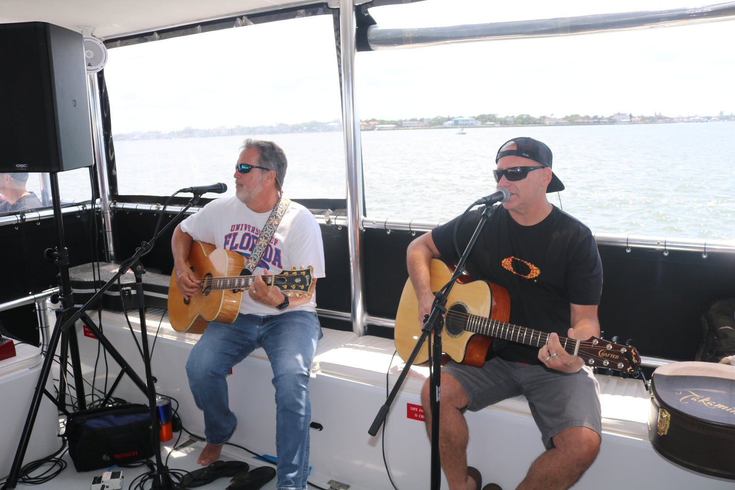Ken Block and Drew Copeland, of Sister Hazel, perform for a limited audience aboard the Sabrage Charters catamaran in St. Augustine.